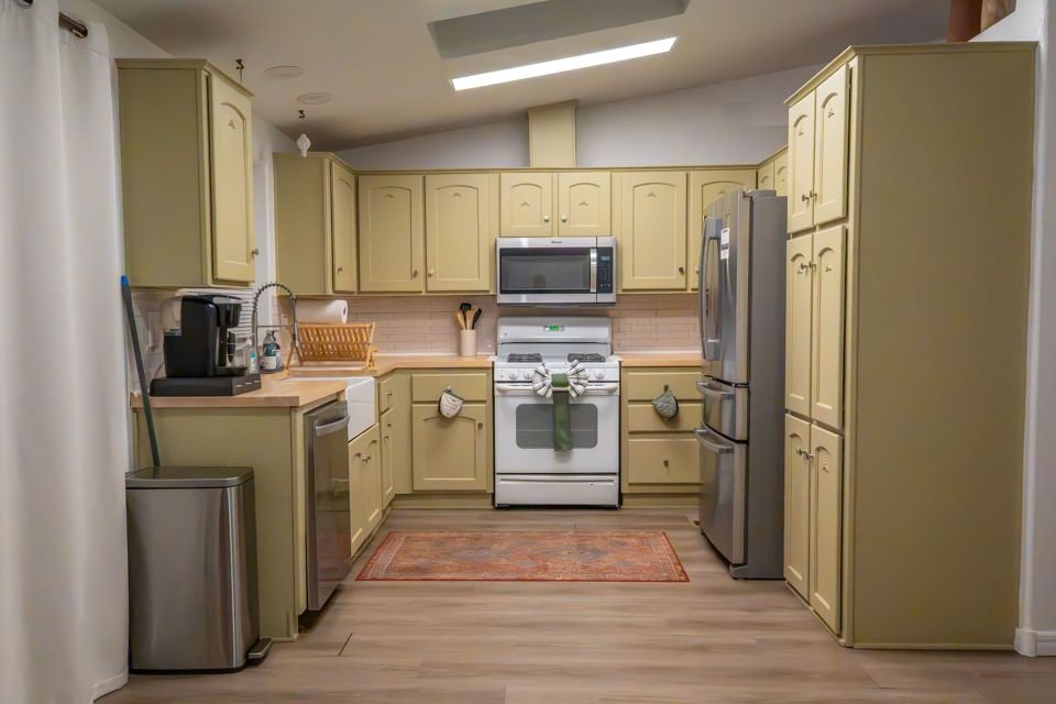 Kitchen with coffee station and dishwasher
